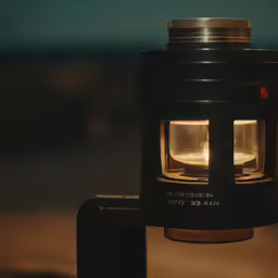 a close up shot of an antique looking lantern