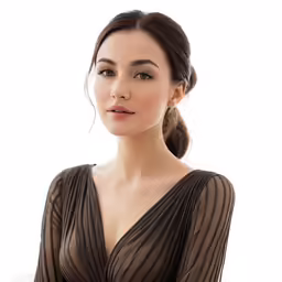 a woman in a brown dress with her hair in a pony tail