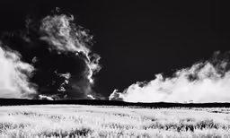 black and white photo of clouds in the sky