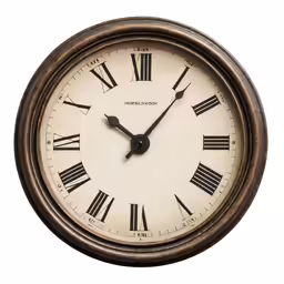 a large wall clock with roman numerals is shown