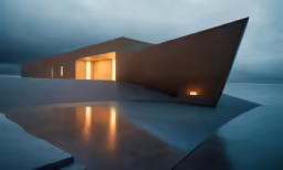 a building sits in the middle of the water