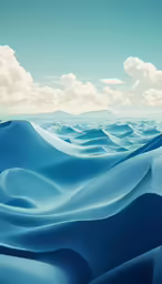 the blue sand dunes with clouds in the sky