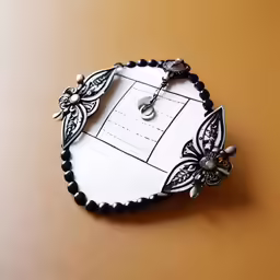 an elaborate design is featured on the back of a card