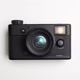 a black camera with a wide lens