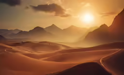 the sun sets over some sand dunes