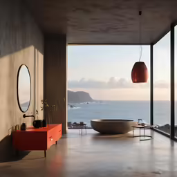 a bowl shaped bathtub next to an open window
