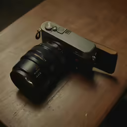 the front of a small camera on a table