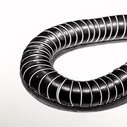 black plastic tubes that are attached to a table