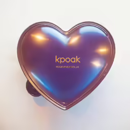a heart shaped package with the words kpoak on it