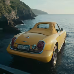the car is parked in the water by the side of the road