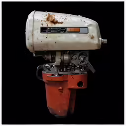an old rusted out machine is sitting against a black background