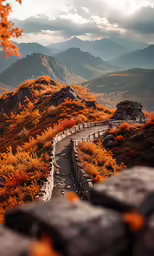 the scenic view from a mountain top overlook shows a path and mountain peaks