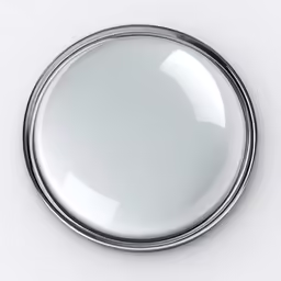 a large silver plate on a white surface
