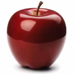 an apple with stem in close up shot against white