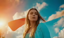 a girl wearing a jacket with her long hair pulled back