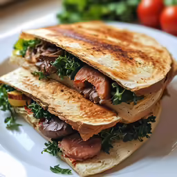 this is some quesadillas with meats and vegetables