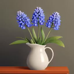 a white vase filled with lots of blue flowers