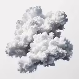 a cluster of white clouds floating in the air