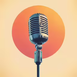 a microphone sits in front of an orange background