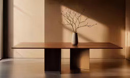 a plant in a vase sitting on top of a table