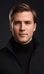 the man has brown hair and black shirt