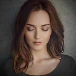 a woman with her eyes closed, with a gray shirt on