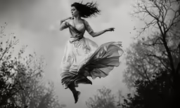 the woman is flying through the air