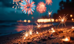 a bunch of fireworks and sparks on the beach