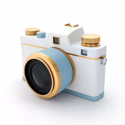 a white camera with gold detailing on top