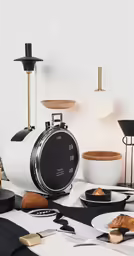 a table with food and black and white decor