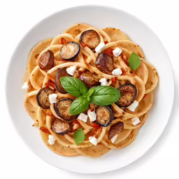a plate of pasta with mushrooms and fettuccine
