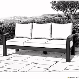 a sofa sits outside on the stone patio