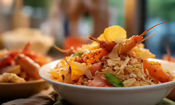 a bowl of food that is sitting on a table