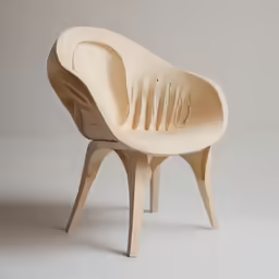 a wooden sculpture of a chair with a curved back
