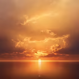 a beautiful sunset that is shining bright over the ocean