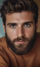 a man with a beard and an intense look