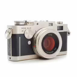 an old - school camera with lens cap