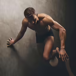 a person doing a trick on a ball
