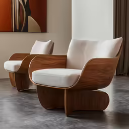 a couple of wooden chairs sitting next to each other