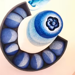there is a bowl with blue candy in it