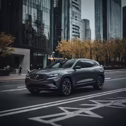a silver suv parked on the road near tall buildings