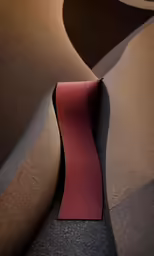 a vase designed to look like a curved curved surface
