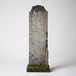 a concrete block with moss growing on top