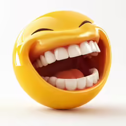 a yellow plastic toy with teeth on top of it