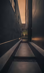 a walkway in an otherwise dark city