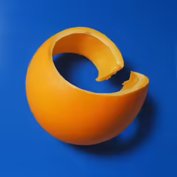 an orange is in the middle of the bowl