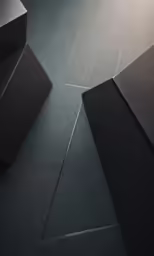 the dark grey paper is folded up on top of the box
