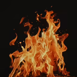 a pile of fire in the middle of night