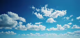there is clouds that are flying through the sky