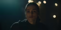 a woman staring into the distance